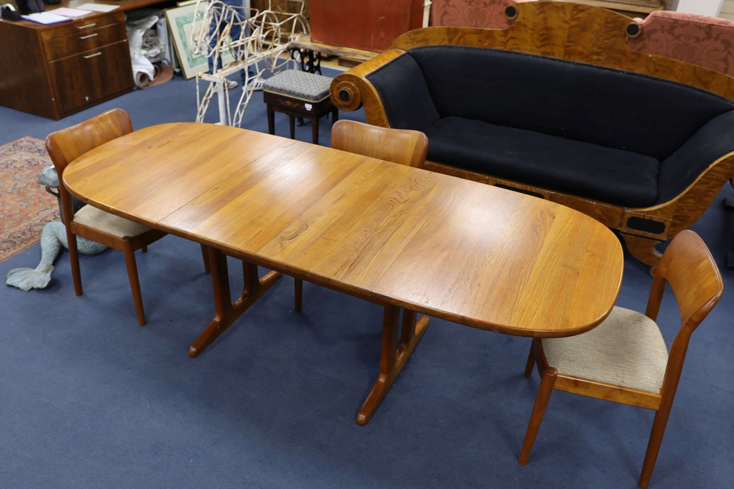 Mid century design. A Niels Koeford Danish teak extending dining table and four chairs, 222cm extended, width 89cm, height 73cm